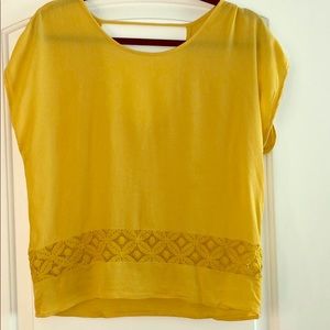 Small yellow blouse.